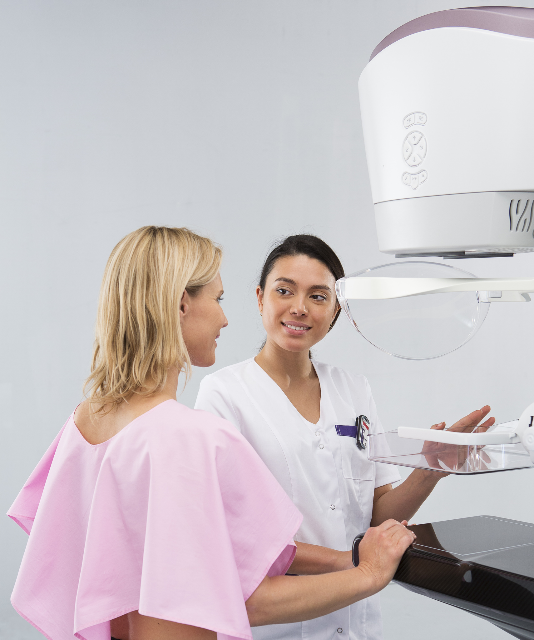 Woman getting mammogram